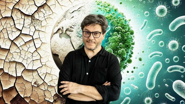 Ricard Solé, public speaker for the 15 year IceLab anniversary public lecture on terraforming ecosystems, seen here against an AI-generated backdrop depicting an arid ecosystem being transformed to a lush one thanks to synthetic organisms.
